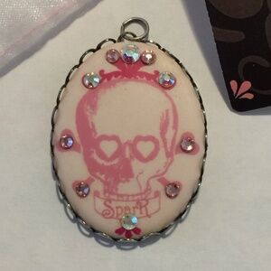 Spark design pink skull pendant